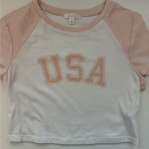 pink and white cropped usa shirt